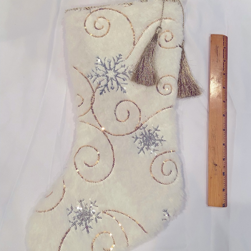 White, silver and gold faux fur stocking.